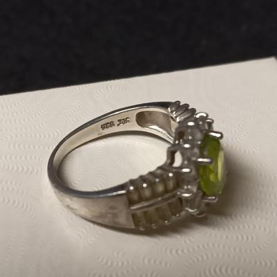 STERLING SILVER WITH LIGHT GREEN BAGUETTES AND CENTER STONE SIZE 8