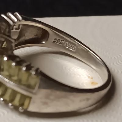 STERLING SILVER WITH LIGHT GREEN BAGUETTES AND CENTER STONE SIZE 8