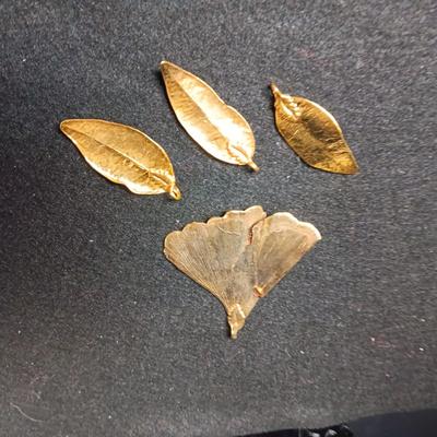 24K GOLD TRIPLE DIPPED MAILE & GINKGO LEAF PENDANTS