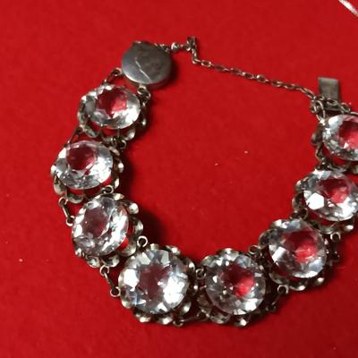 STERLING SILVER CHAIN AND PENDANT PLUS A STERLING BRACELET WITH GLASS STONES