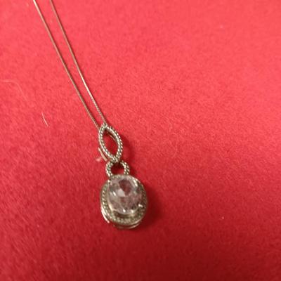 STERLING SILVER CHAIN AND PENDANT PLUS A STERLING BRACELET WITH GLASS STONES