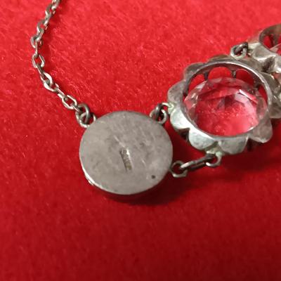 STERLING SILVER CHAIN AND PENDANT PLUS A STERLING BRACELET WITH GLASS STONES