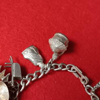 STERLING SILVER CHARM BRACELET 41.37g