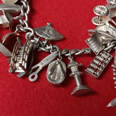 STERLING SILVER CHARM BRACELET 41.37g