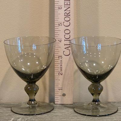 LOT 26K: Incomplete Set Of Circa 1980's, Smokey Colored Glasses, 12 Champagne Goblets, 10 Wine Goblets, & 2 Small Goblets