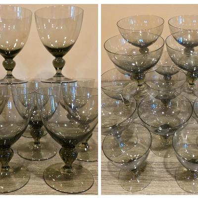 LOT 26K: Incomplete Set Of Circa 1980's, Smokey Colored Glasses, 12 Champagne Goblets, 10 Wine Goblets, & 2 Small Goblets