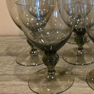 LOT 26K: Incomplete Set Of Circa 1980's, Smokey Colored Glasses, 12 Champagne Goblets, 10 Wine Goblets, & 2 Small Goblets