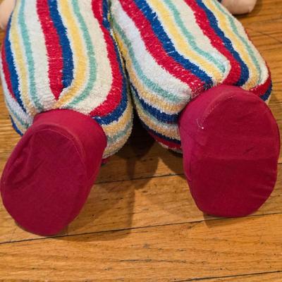 LOT 82: 2 Vintage Celluloid Face Dolls W/Cloth Bodies, One In A Bunny Suit & The Other In Stripes W/A Red Pull Down Hood