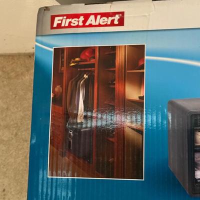 LOT 124G: First alert digital fire safe waterproof safe IN BOX