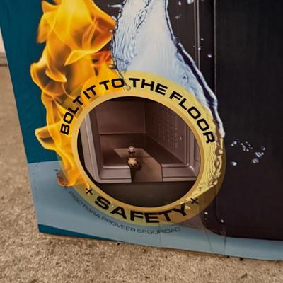 LOT 124G: First alert digital fire safe waterproof safe IN BOX