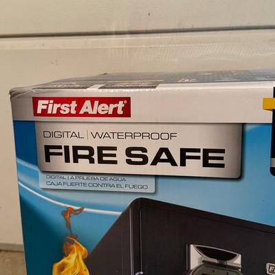 LOT 124G: First alert digital fire safe waterproof safe IN BOX
