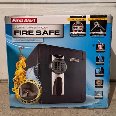 LOT 124G: First alert digital fire safe waterproof safe IN BOX