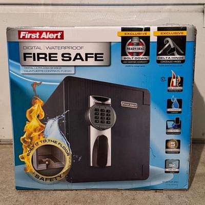LOT 124G: First alert digital fire safe waterproof safe IN BOX