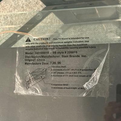 LOT 132B: Glass Top TV Stand w/ Yamaha Speaker System NS-AC200