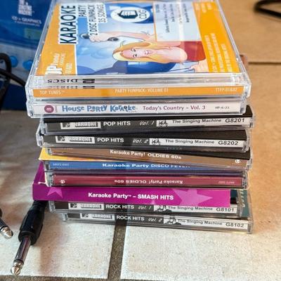 LOT 144W: MTV Karaoke Machine w/ Box, 2 Microphones & CDs