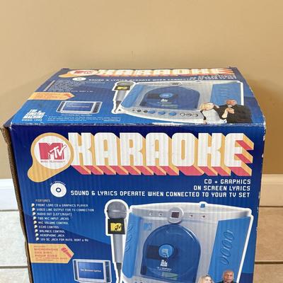 LOT 144W: MTV Karaoke Machine w/ Box, 2 Microphones & CDs
