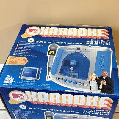 LOT 144W: MTV Karaoke Machine w/ Box, 2 Microphones & CDs