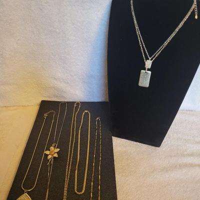 1 TRIFARI AND 5 OTHER NECKLACES