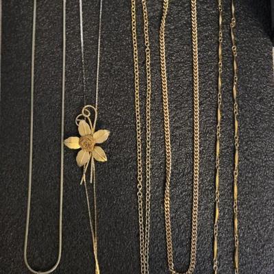 1 TRIFARI AND 5 OTHER NECKLACES