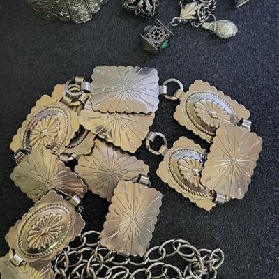 SILVER-TONE JEWELRY AND CONCHO BELT