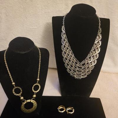 2 SILVER-TONE NECKLACES AND A PAIR OF EARRINGS