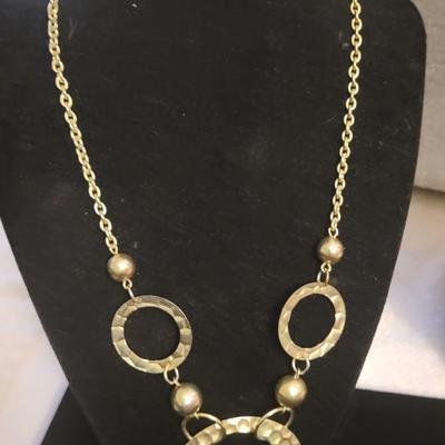 2 SILVER-TONE NECKLACES AND A PAIR OF EARRINGS