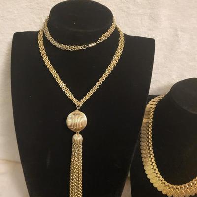 3 GOLD-TONE NECKLACES AND A PAIR OF CLIP ON EARRINGS