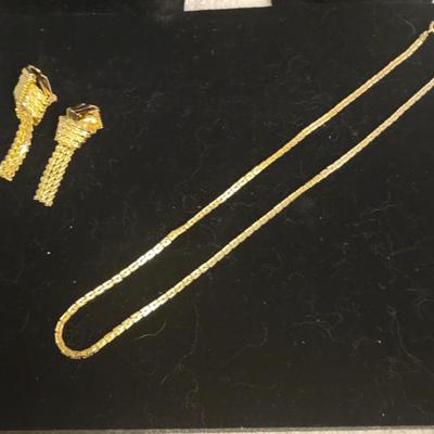 3 GOLD-TONE NECKLACES AND A PAIR OF CLIP ON EARRINGS