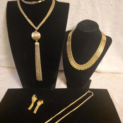 3 GOLD-TONE NECKLACES AND A PAIR OF CLIP ON EARRINGS