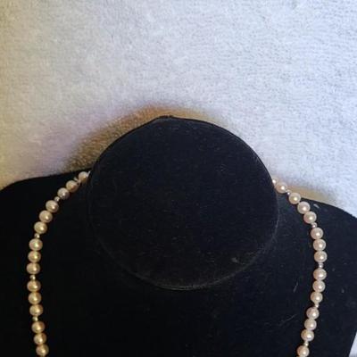 GENUINE PEARL NECKLACE AND 4 PAIRS OF EARRINGS
