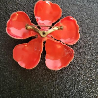 3 CLIP ON EARRINGS AND A BROOCH