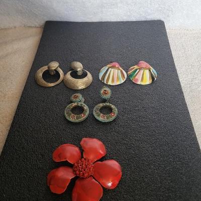 3 CLIP ON EARRINGS AND A BROOCH