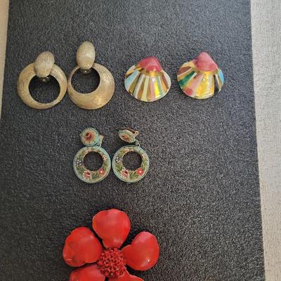 3 CLIP ON EARRINGS AND A BROOCH