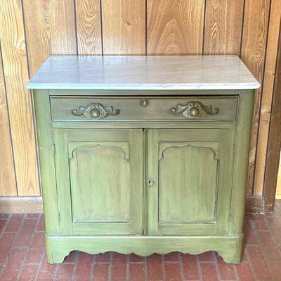 LOT 64: Vintage Painted Green Cabinet with Marble Top