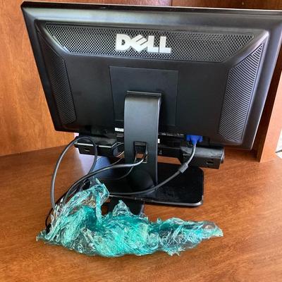 LOT 70: Office Desk with Contents - Dell Monitor SE198WFPv, Tablets, Paper, Picture Frames and More