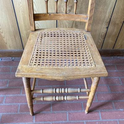 LOT 71: Four Handcrafted Vintage Caned Seat Wooden Chairs