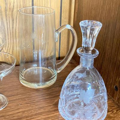 LOT 75: Cabinet / Bar with Contents and Large Collection of Glasses, Decanters, Pitchers and More