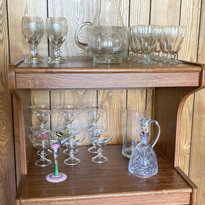 LOT 75: Cabinet / Bar with Contents and Large Collection of Glasses, Decanters, Pitchers and More