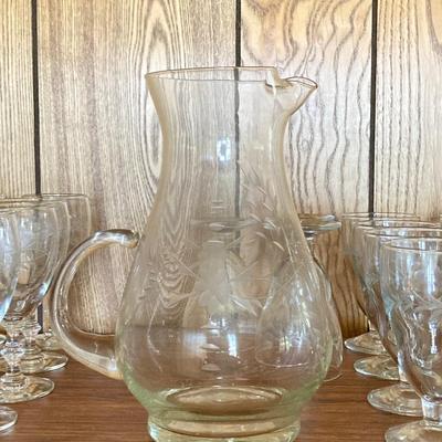 LOT 75: Cabinet / Bar with Contents and Large Collection of Glasses, Decanters, Pitchers and More