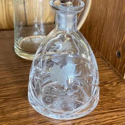 LOT 75: Cabinet / Bar with Contents and Large Collection of Glasses, Decanters, Pitchers and More