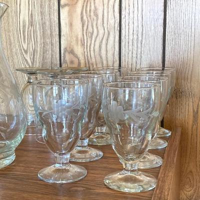 LOT 75: Cabinet / Bar with Contents and Large Collection of Glasses, Decanters, Pitchers and More