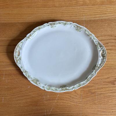 LOT 85: Primitive Plate Holder Royal Daulton, Limoges & Canonsburg China Plates