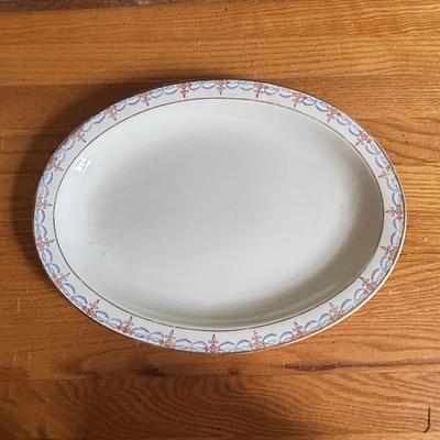 LOT 85: Primitive Plate Holder Royal Daulton, Limoges & Canonsburg China Plates