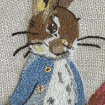 LOT 95: Vintage Peter Rabbit Needlepoint, Books along with Canonsburg Pottery Divided Childs Dish, Gingerbread Bear & Bearly People Bear