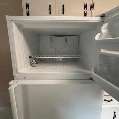 LOT 105: Working Frigidaire Refrigerator FFHT1817LW8