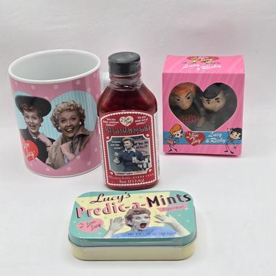 LOT 128: I Love Lucy and Lucy Loves Muffins/ Keurig Coffee Maker, Muffin Maker, "Lucy" Items, Coffee Sign, and Clock