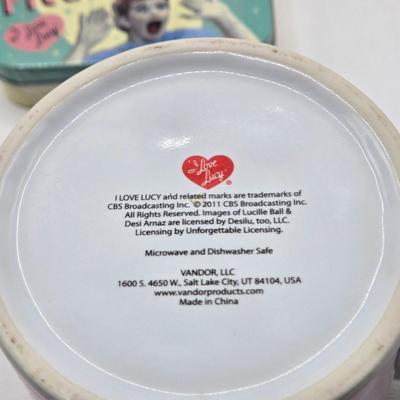 LOT 128: I Love Lucy and Lucy Loves Muffins/ Keurig Coffee Maker, Muffin Maker, "Lucy" Items, Coffee Sign, and Clock