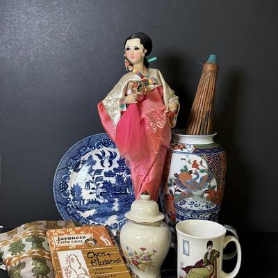 LOT 129: Andrea by Sadek Vase, 3 Piece Tea Cup Set, Asian Doll on Stand, Vintage Japanese Umbrella, and More