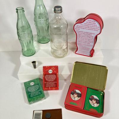 LOT 175: Coca Cola / Beverage Collection and More - Vintage Bottles, Tin Can Canjo, Wooden Crate, Tins, Playing Cards and More