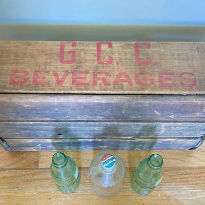LOT 175: Coca Cola / Beverage Collection and More - Vintage Bottles, Tin Can Canjo, Wooden Crate, Tins, Playing Cards and More